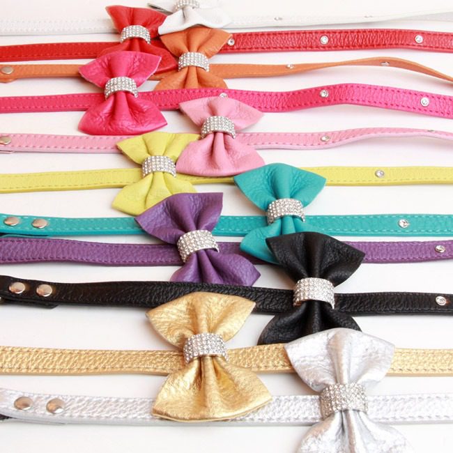 A bunch of different colored bows on some straps